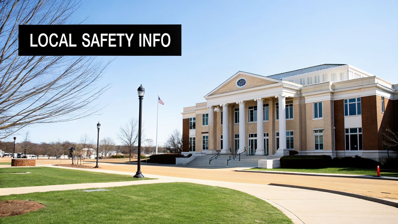 A large institutional building with columns, an American flag, trees, and 'LOCAL SAFETY INFO' banner under a blue sky.