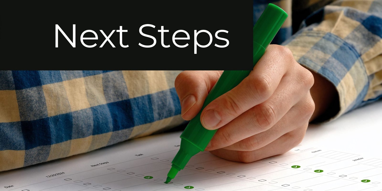 A close-up view of a person using a green marker to check off a task list.